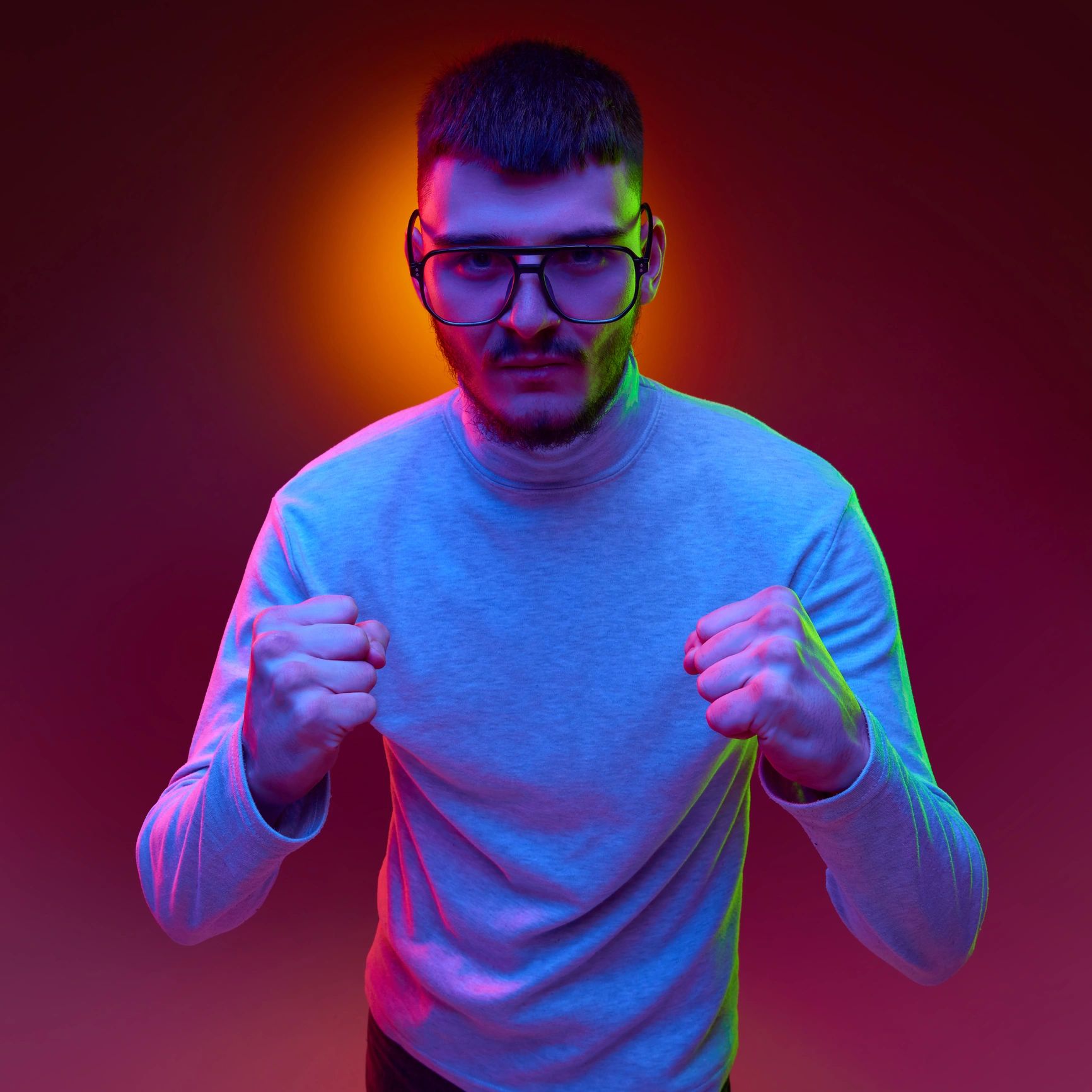 Portrait of a young creative editor in studio lighting